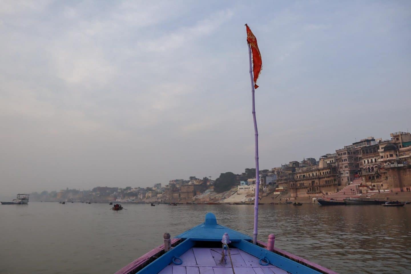 Sunrise Boat Trip on River Ganges - boat on the river ganges at sunrise in varanasi | 2 week India itinerary