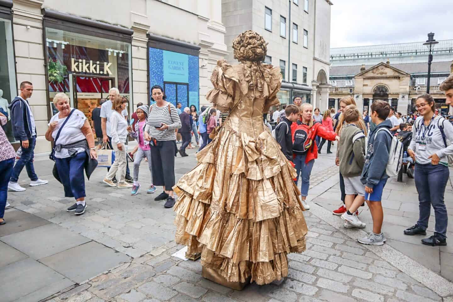 Covent Garden Street Performer - covent garden women street performer in dress covered in gold | covent garden london guide