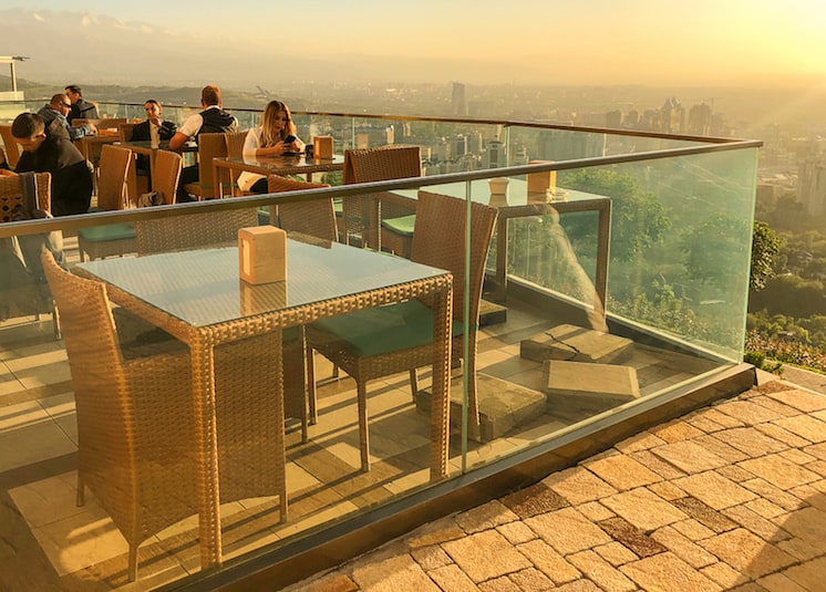 Almaty Kazakhstan - rooftop bar in Almaty Kazakstan at sunset weather | best places to travel in Asia in July and August