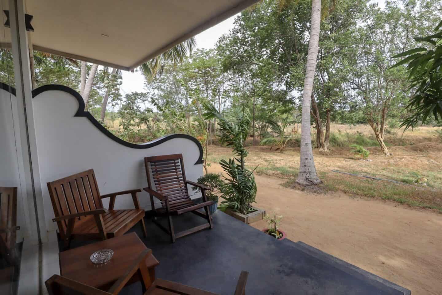 Kings Village Sigiriya Hotel Patio - Cost of Travel in Sri Lanka, Kings Village Sigiriya Hotel Patio with seats