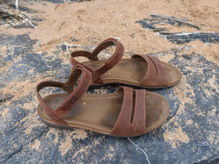 Sandals to pack for India - female packing list India, Keen Brown Sandals on rock with sand