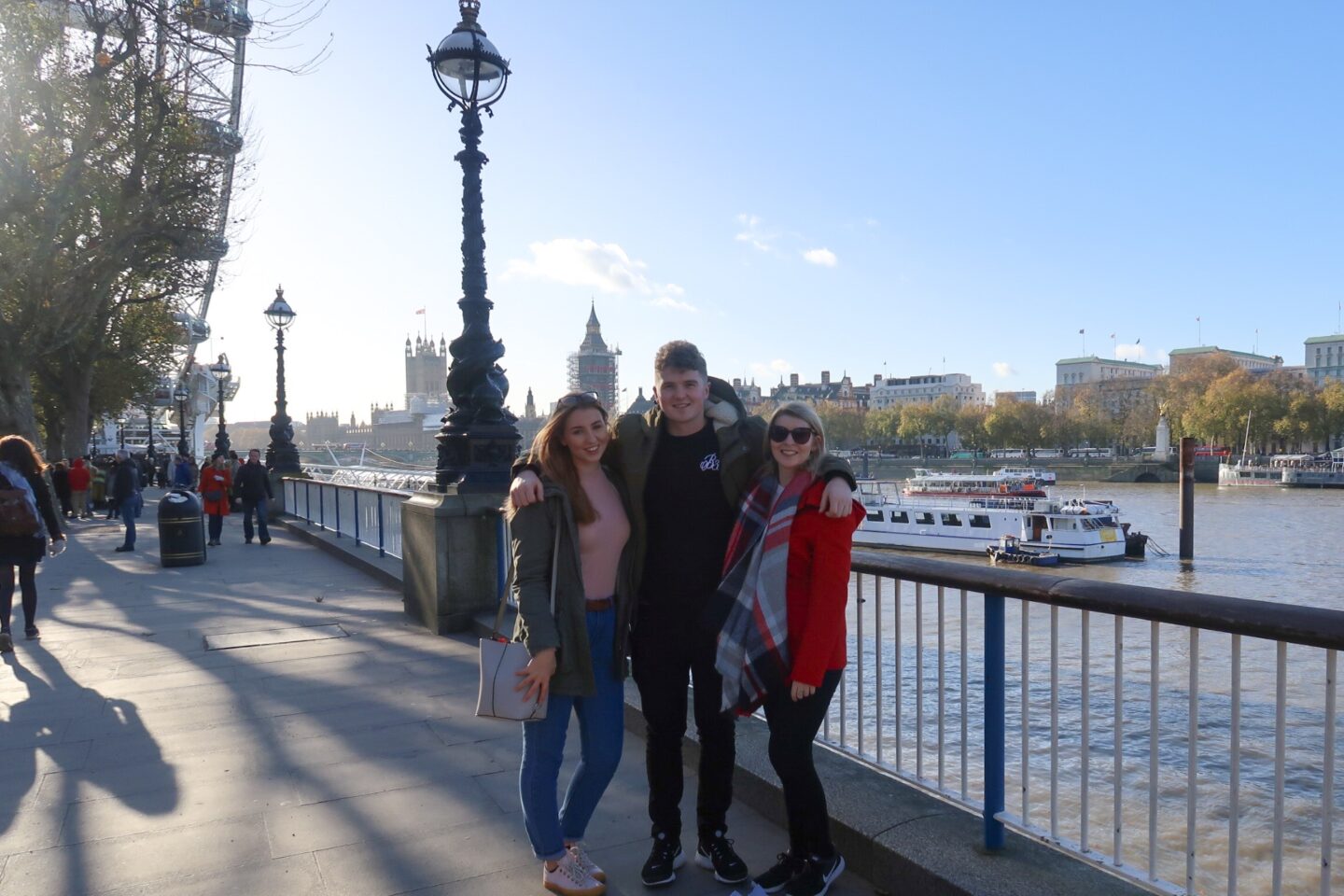 London Winter Outfits - London in Winter, three people in London wearing winter outfits