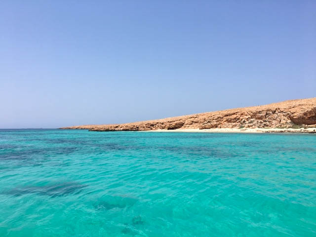 Oman Dayminath Island - blue ocean Oman | best places to travel in Asia December and January