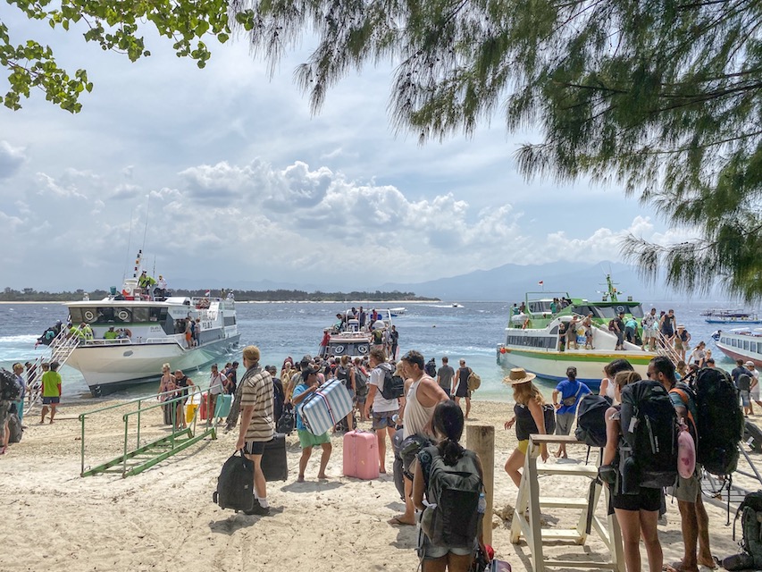 Gili Trawangan Pier - boats and backpackers arriving on Gili T | how to get to Gili T