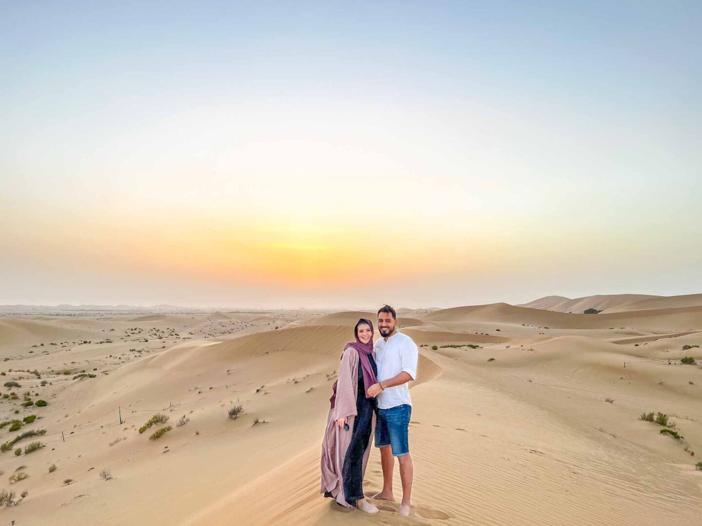 Things to do in Abu Dhabi, couple on Abu Dhabi Desert Safari - Things to do in Abu Dhabi, couple on Abu Dhabi Desert Safari