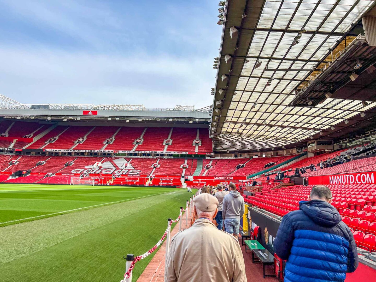 Manchester United Stadium Tour, walking up side of pitch on tour - Manchester United Stadium Tour, walking up side of pitch on tour