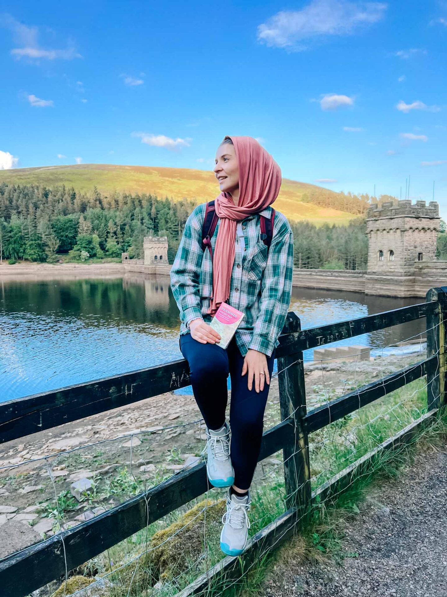 KEEN NIXIS EVO review, Ellie on fence in boots in Peak District - KEEN NIXIS EVO review, Ellie on fence in boots in Peak District
