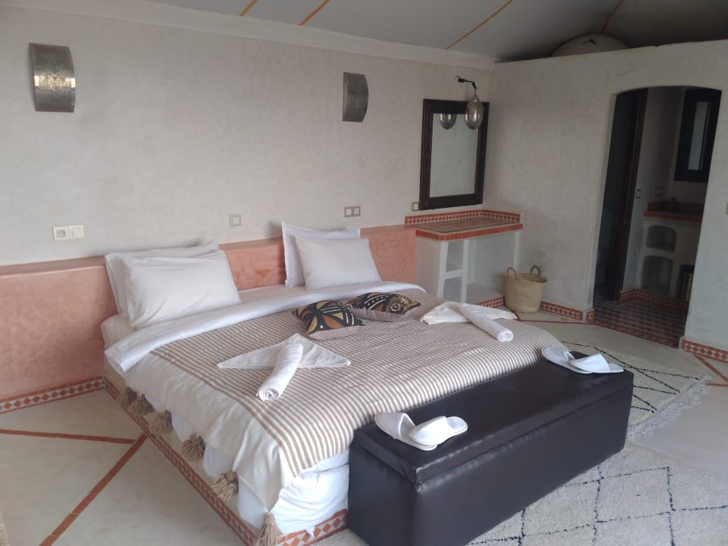 Women's Group Tour to Morocco with Ellie Quinn - bedroom in desert camp, Women's Group Tour to Morocco with Ellie Quinn