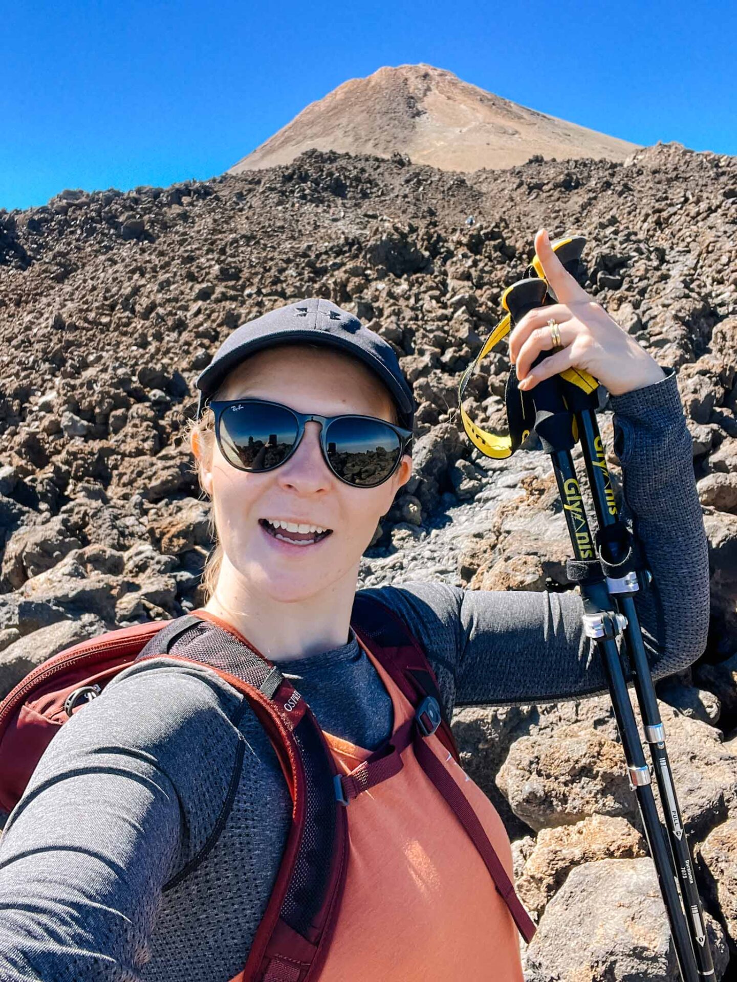 Hiking Mount Teide, Ellie pointing to top of Mount Teide - Hiking Mount Teide, Ellie pointing to top of Mount Teide