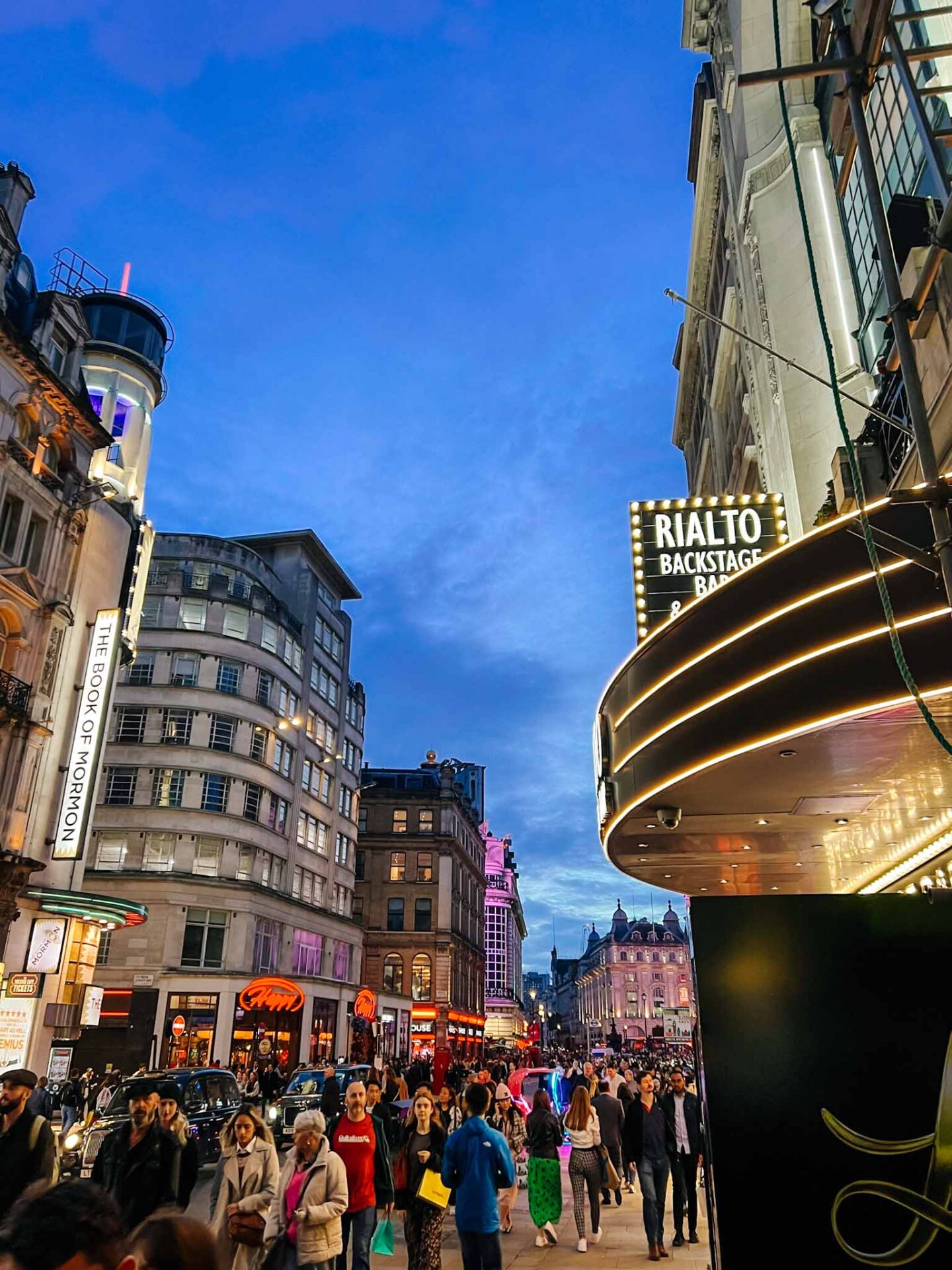 Leicester Square at night, London with kids, London with kids itinerary, - The Wandering Quinn Travel Blog Leicester Square at night, London with kids, London with kids itinerary,