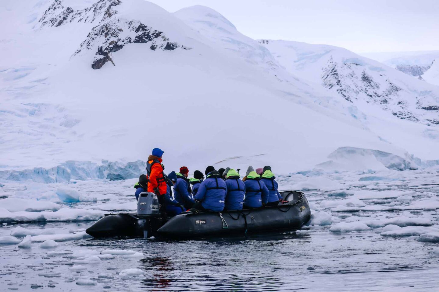 group on zodiac in Antarctica from afar, What to wear in Antarctica, What to pack for Antarctica, - group on zodiac in Antarctica from afar, What to wear in Antarctica, What to pack for Antarctica,