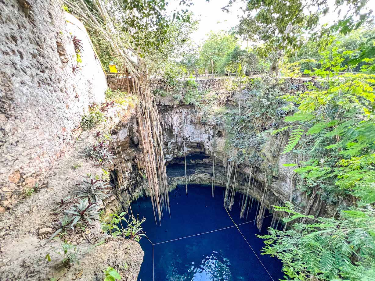 Oxman Cenote from above, Yucatan Road Trip, 1 week Mexico itinerary, - The Wandering Quinn Travel Blog Oxman Cenote from above, Yucatan Road Trip, 1 week Mexico itinerary,