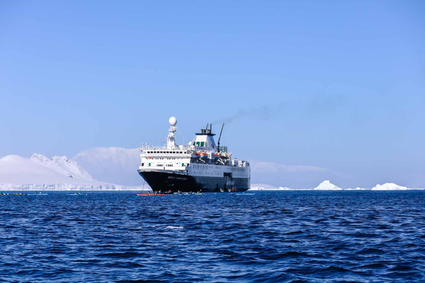 The Ocean Endeavour ship with blue sky in Antarctica, Can you visit Antarctica, - The Wandering Quinn Travel Blog The Ocean Endeavour ship with blue sky in Antarctica, Can you visit Antarctica,