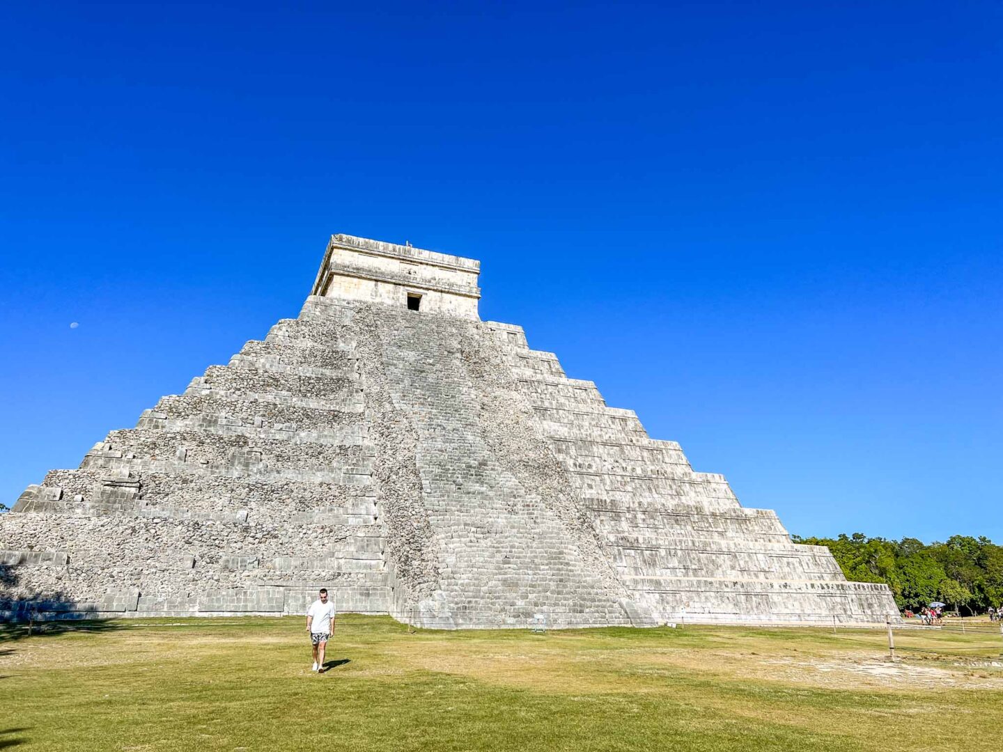 Chichen Itza with blue sky, Yucatan Road Trip, 1 week Mexico itinerary, - The Wandering Quinn Travel Blog Chichen Itza with blue sky, Yucatan Road Trip, 1 week Mexico itinerary,