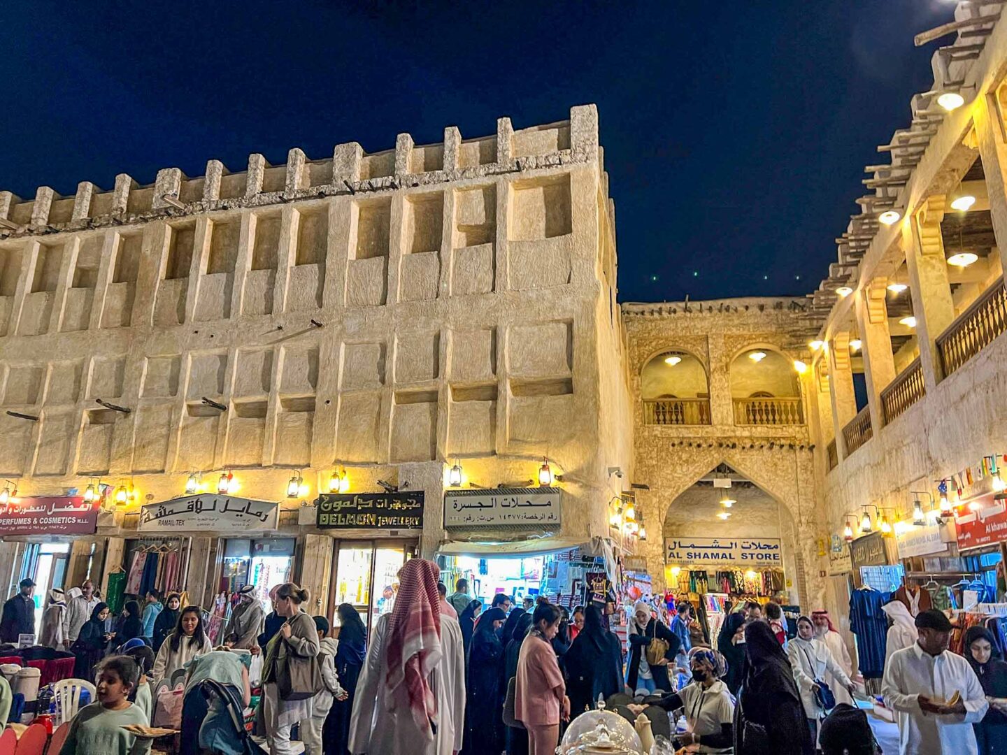 Locals and tourists in Souq Waqif at night, Qatar dress code, what to wear in Qatar, - Locals and tourists in Souq Waqif at night, Qatar dress code, what to wear in Qatar,