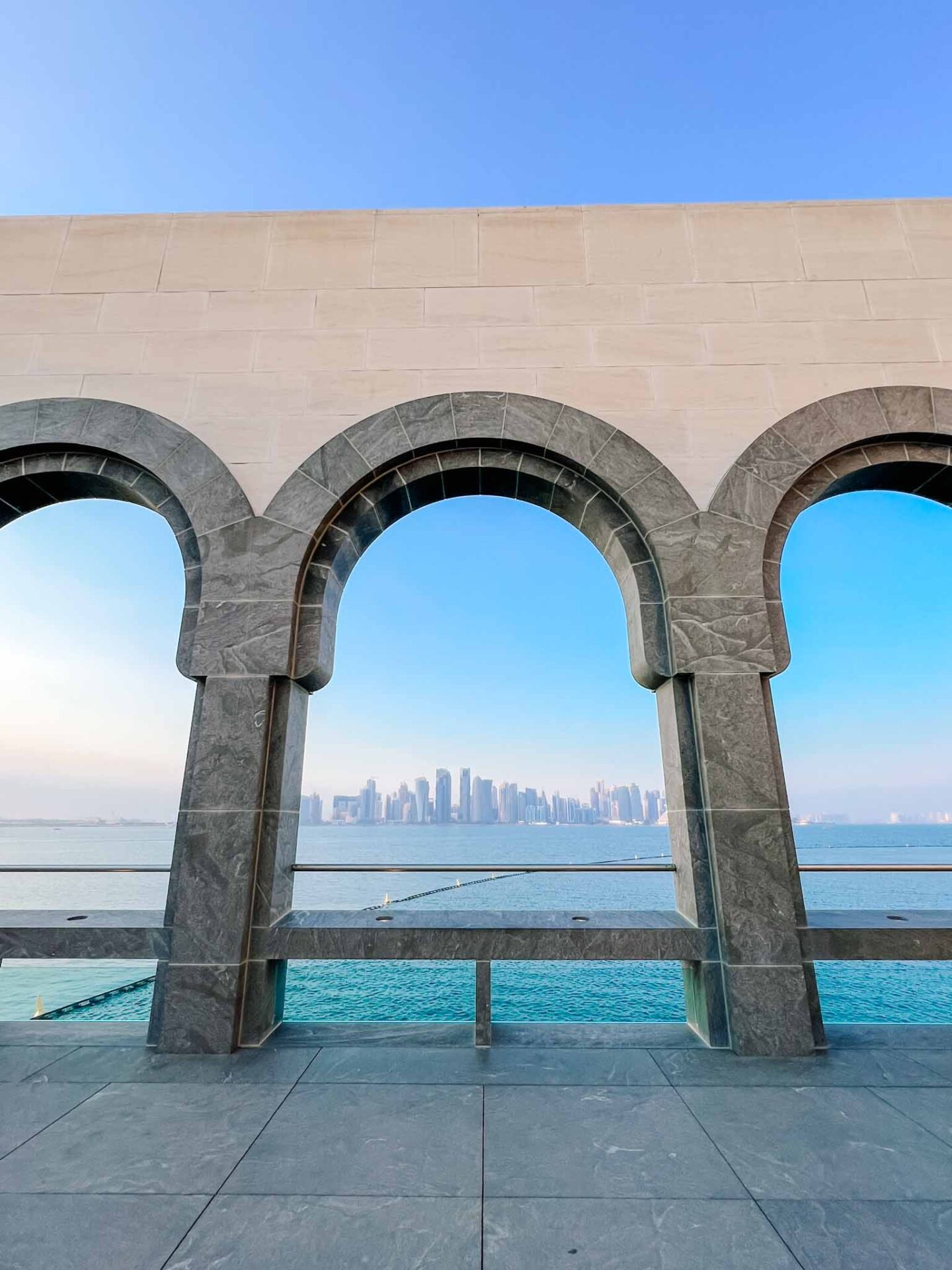 Doha city skyline view from arches in museum of Islamic art, Doha itinerary, Qatar itinerary - Doha city skyline view from arches in museum of Islamic art, Doha itinerary, Qatar itinerary