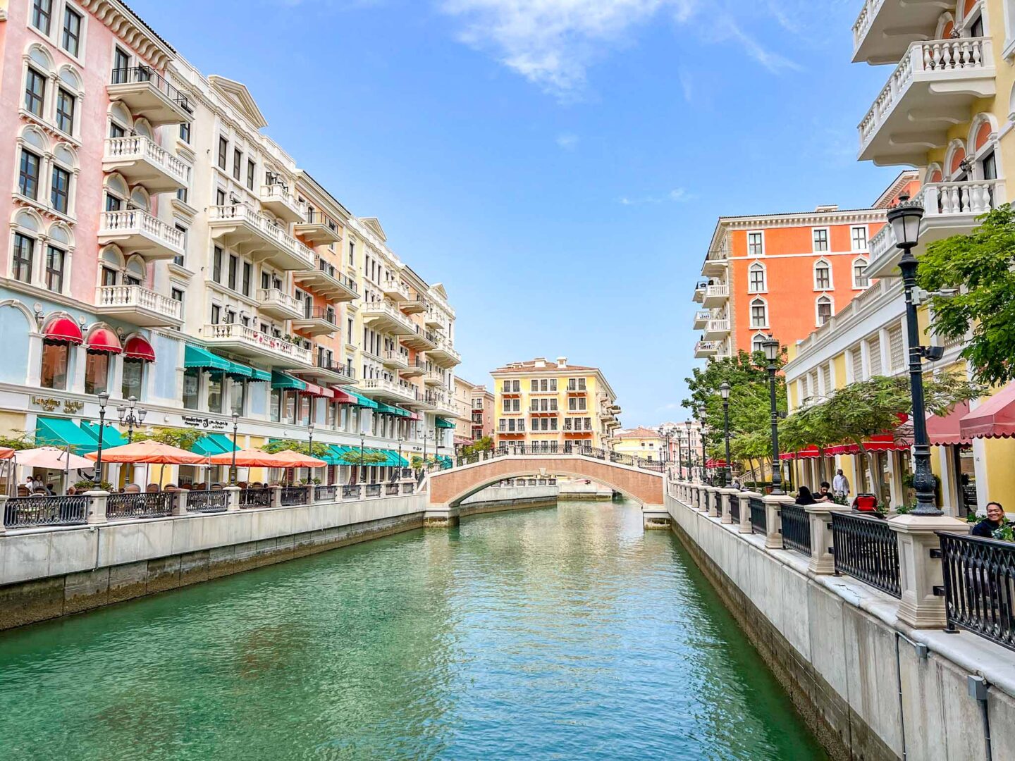 Qanat Quartier canals in doha with blue sky, Doha itinerary, Qatar itinerary - Qanat Quartier canals in doha with blue sky, Doha itinerary, Qatar itinerary