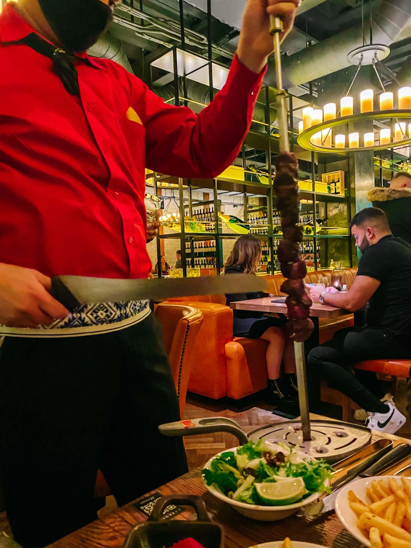 halal restaurants in manchester, halal meat being cut in Fazenda restaurant, best halal meat in Manchester - halal restaurants in manchester, halal meat being cut in Fazenda restaurant, best halal meat in Manchester