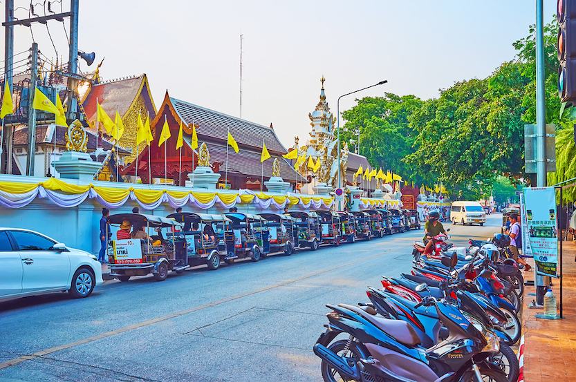 Tuk tuk parking at the wall of Wat Chedi Luang, on May 3 in Chiang Mai, Thailand - Tuk Tuk parking at wall of Wat Chedi Luang, on May 3 in Chiang Mai, what is chiang mai known for, chiang mai must see spots
