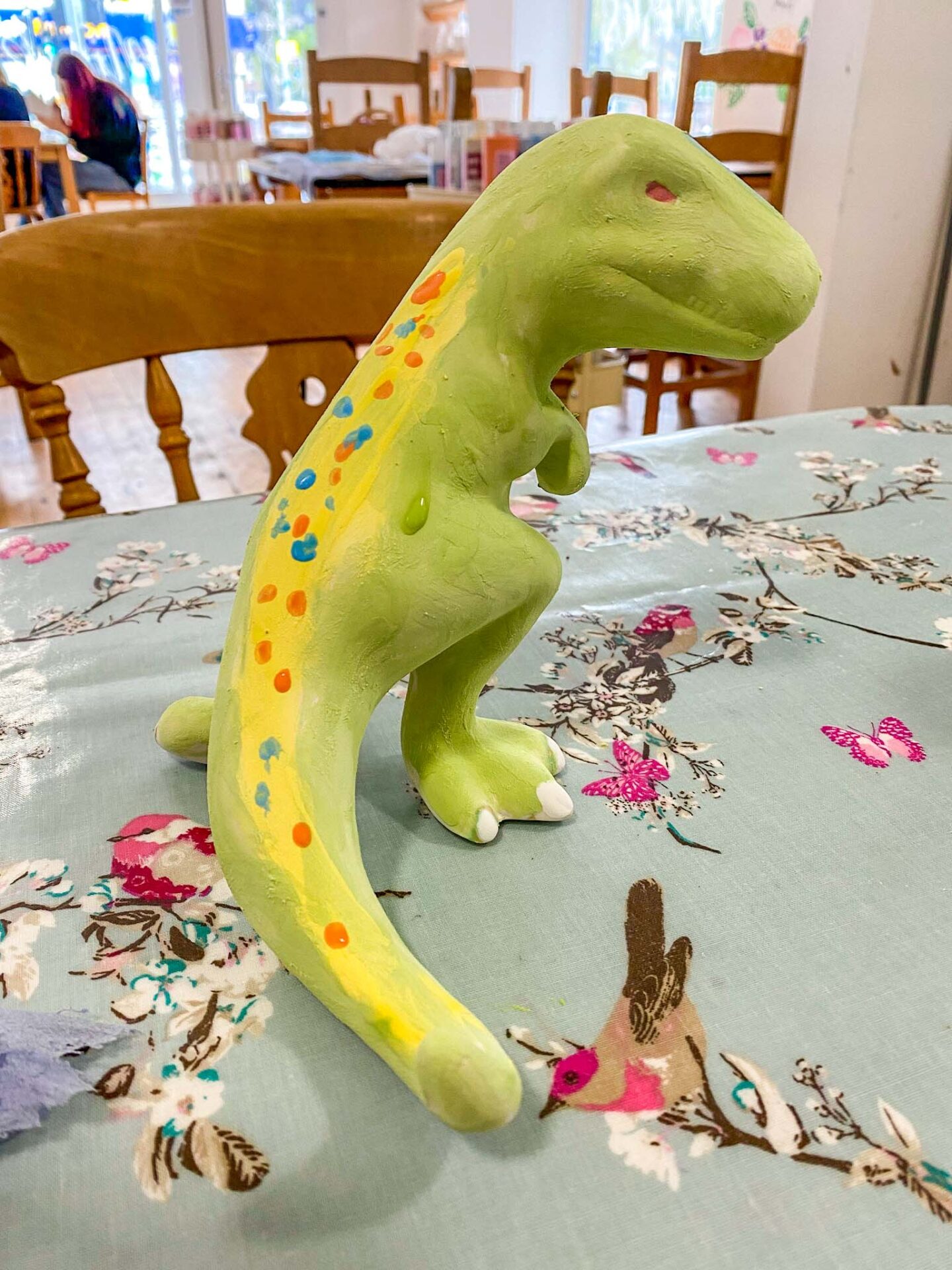 dinosaur pottery painting by child, Family Days Out in Manchester, Manchester with kids, - dinosaur pottery painting by child, Family Days Out in Manchester, Manchester with kids,