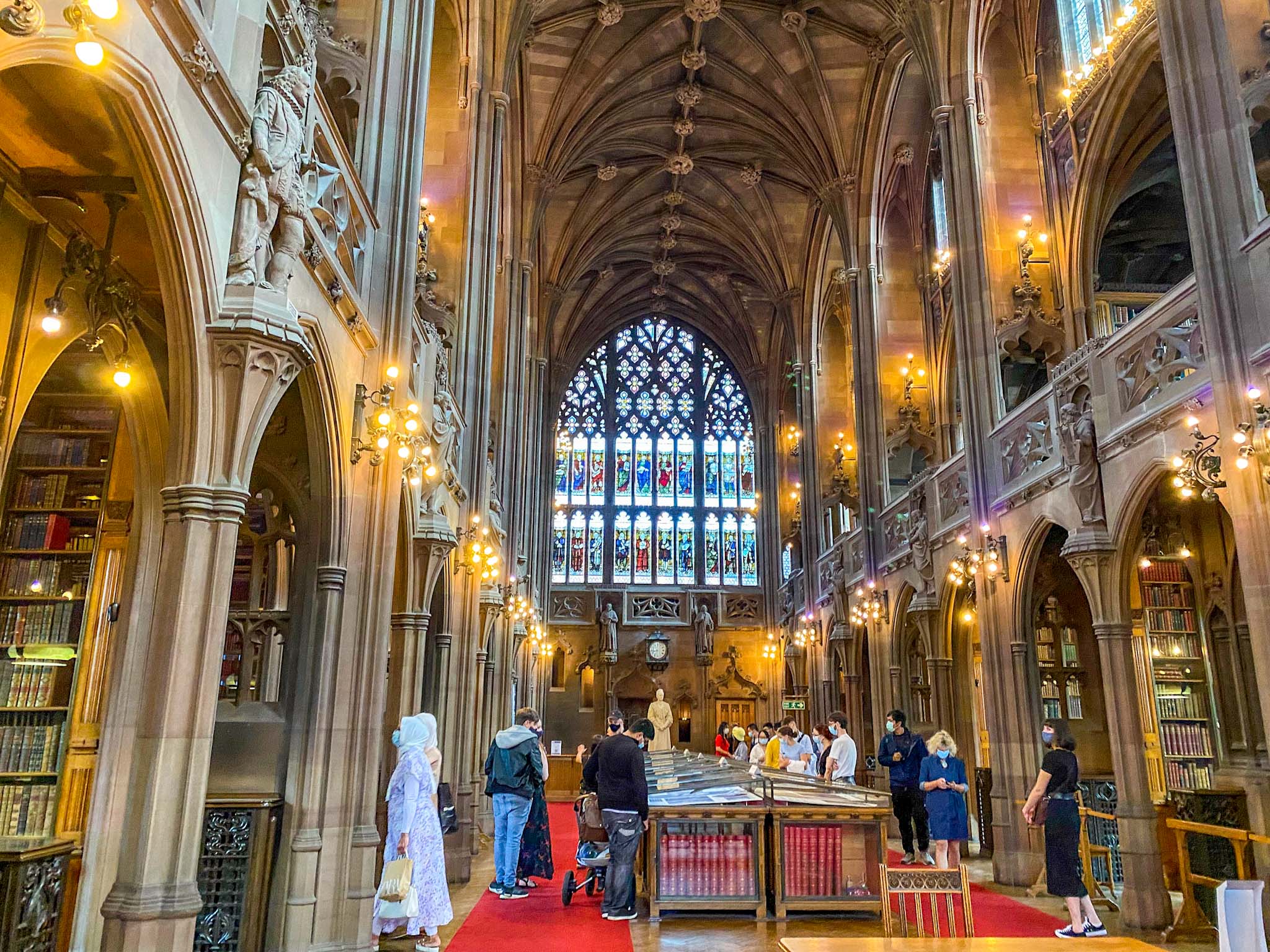 inside the hall of John Rylands Library, playing inside treetops adventure golf, Family Days Out in Manchester, Manchester with kids, - inside the hall of John Rylands Library, playing inside treetops adventure golf, Family Days Out in Manchester, Manchester with kids,