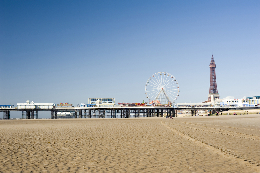 Family Days Out Near Manchester, Blackpool Beach with Tower and Pleasure beach in distance - Family Days Out Near Manchester, Blackpool Beach with Tower and Pleasure beach in distance