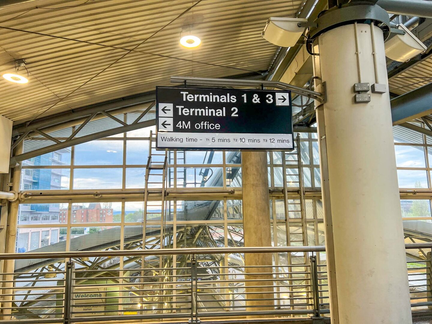 Manchester Airport to Manchester Piccadilly, terminal signage at Manchester Airport train station - Manchester Airport to Manchester Piccadilly, terminal signage at Manchester Airport train station