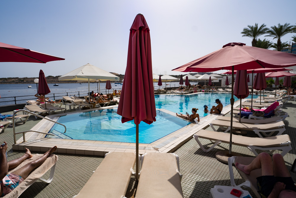 Relaxing at Pool - Things To Do In Mellieha Day By The Pool