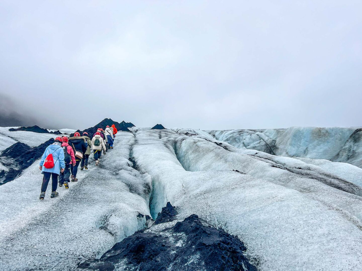 Iceland in May and June, people doing Iceland's easy glacier hike - Iceland in May and June, people doing Iceland's easy glacier hike