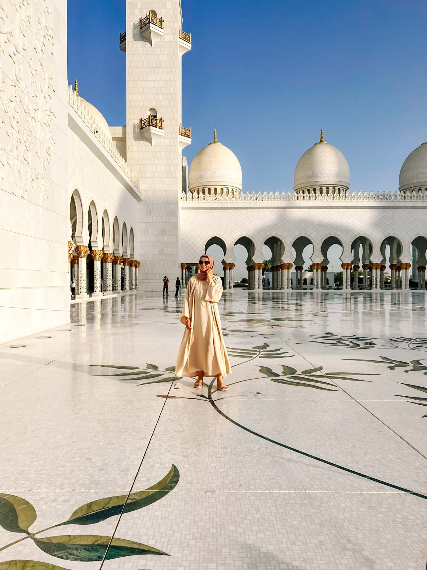 Zayed mosque courtyard, visiting Sheikh Zayed Mosque - Ellie inside the Sheikh Zayed mosque courtyard, visiting Sheikh Zayed Mosque