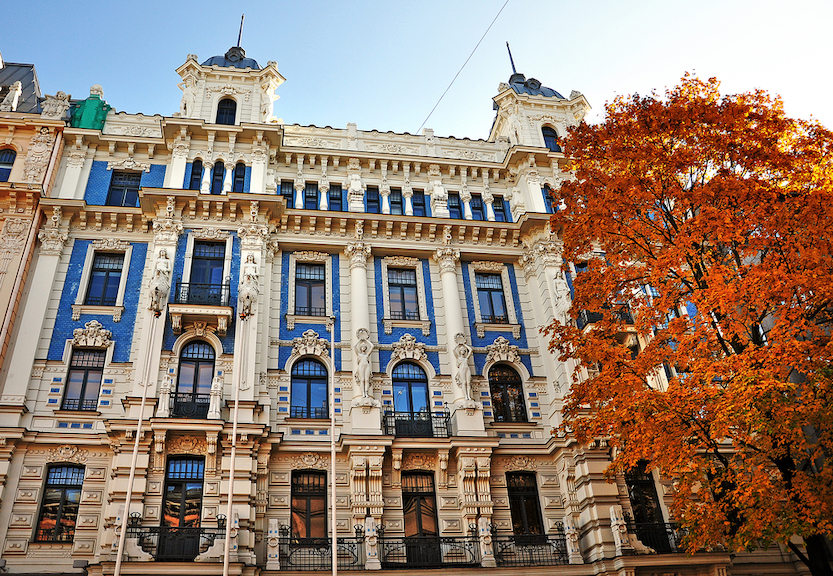 Things to do in Riga, Art Nouveau District in Riga with building and tree - Things to do in Riga, Art Nouveau District in Riga with building and tree
