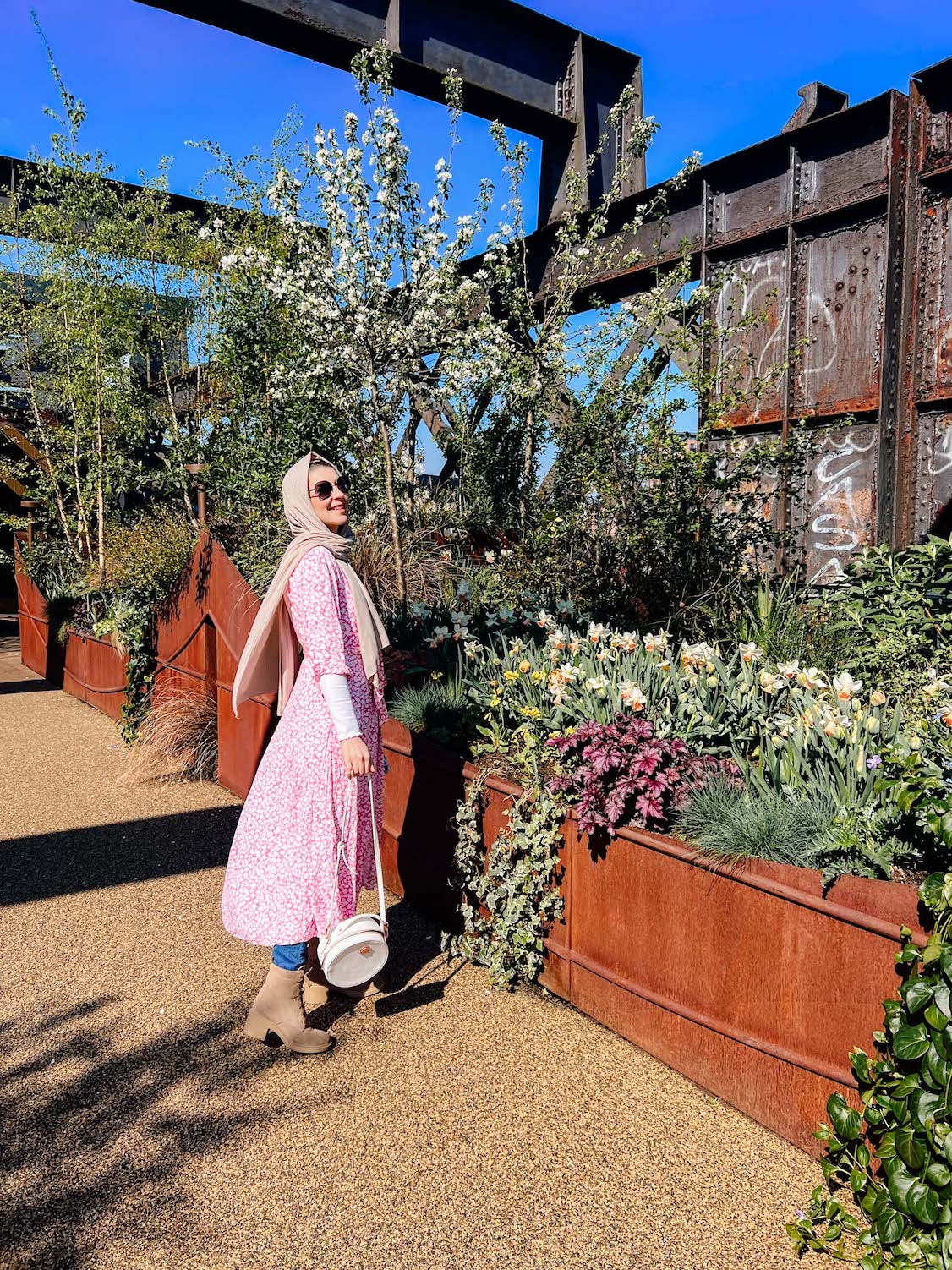 Cherry blossom Manchester, Ellie at Castlefield Viaduct with cherry blossom - Cherry blossom Manchester, Ellie at Castlefield Viaduct with cherry blossom