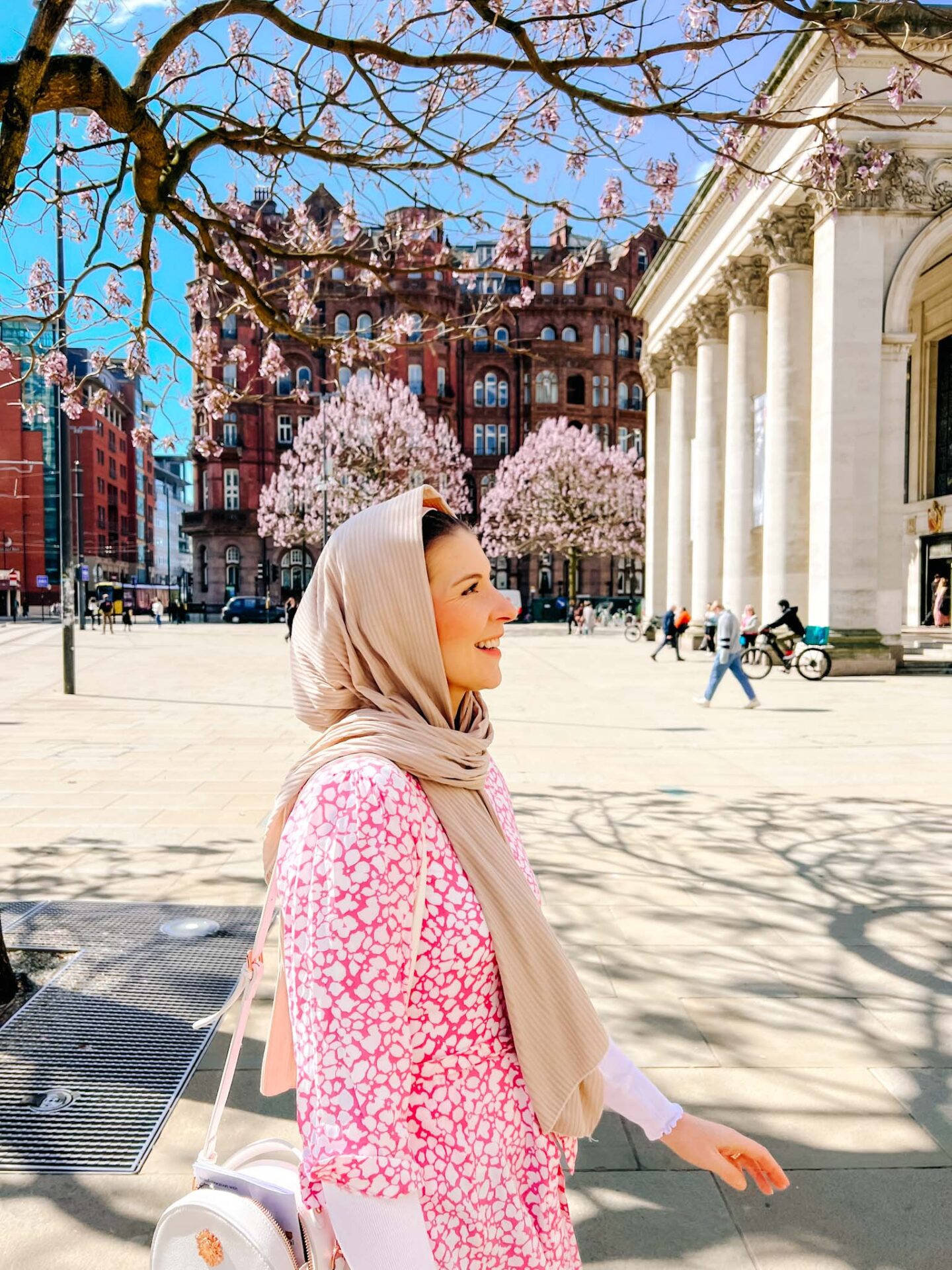 Ellie with Cherry blossom in Manchester near Manchester library - Cherry blossom Manchester, Ellie with Cherry blossom in Manchester near Manchester library