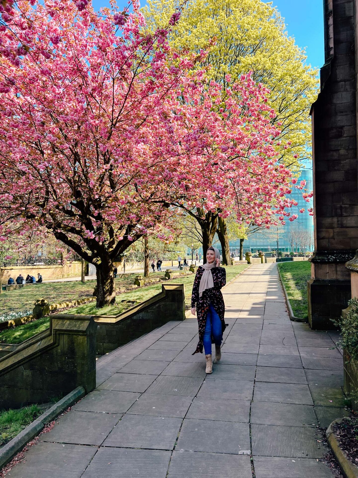 Ellie with Ellie with Cherry blossom at Manchester Cathedral - Cherry blossom Manchester, Ellie with Ellie with Cherry blossom at Manchester Cathedral