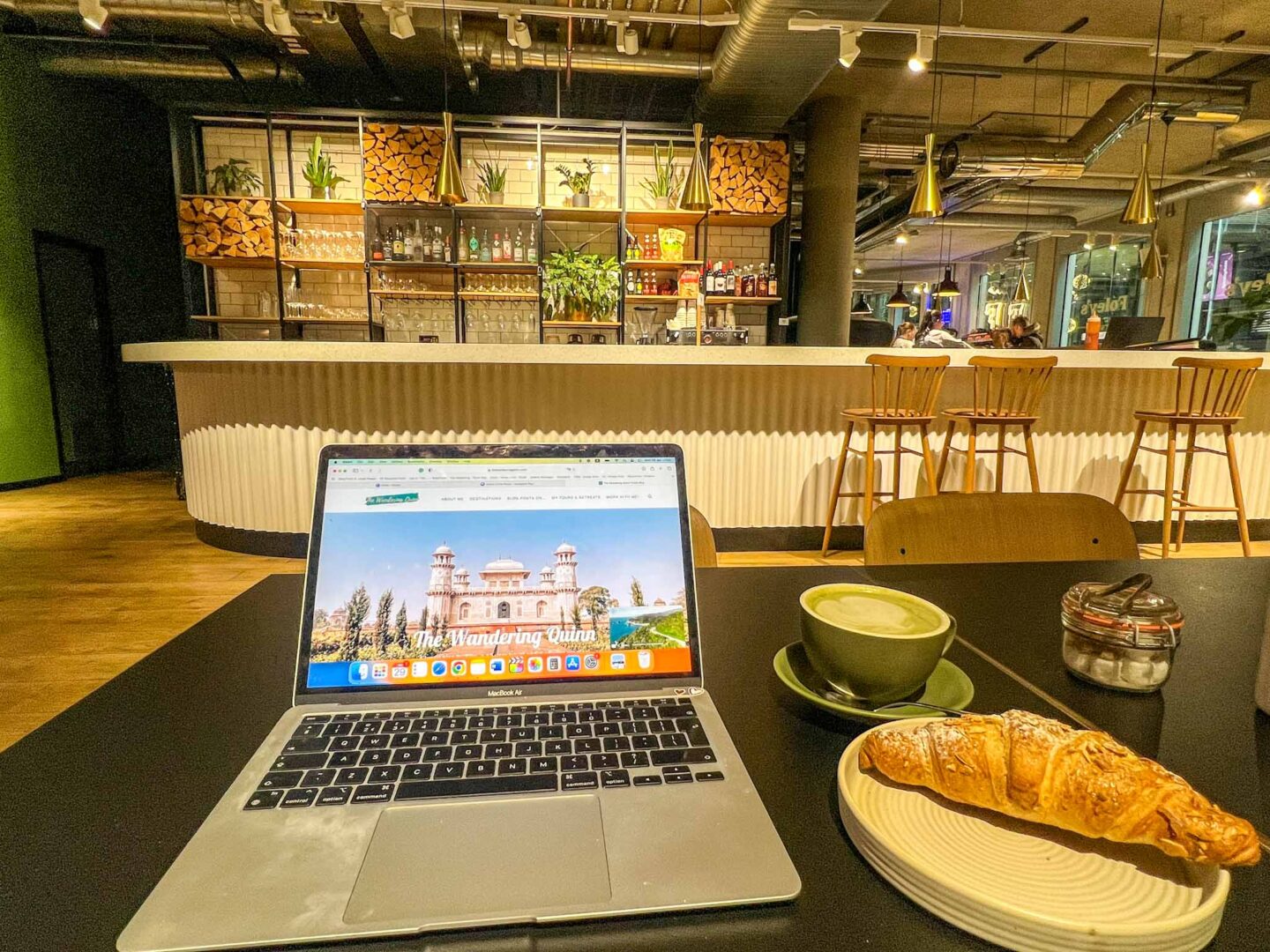 Manchester cafes to work from, Foleys Cafe coffee and pastry with laptop on show - Manchester cafes to work from, Foleys Cafe coffee and pastry with laptop on show