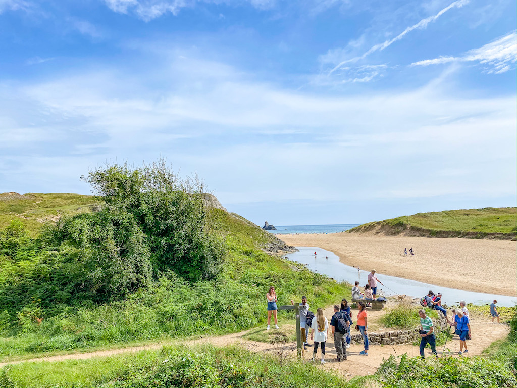 best beaches in South Wales, broad haven beach with people in summer - best beaches in South Wales, broad haven beach with people in summer