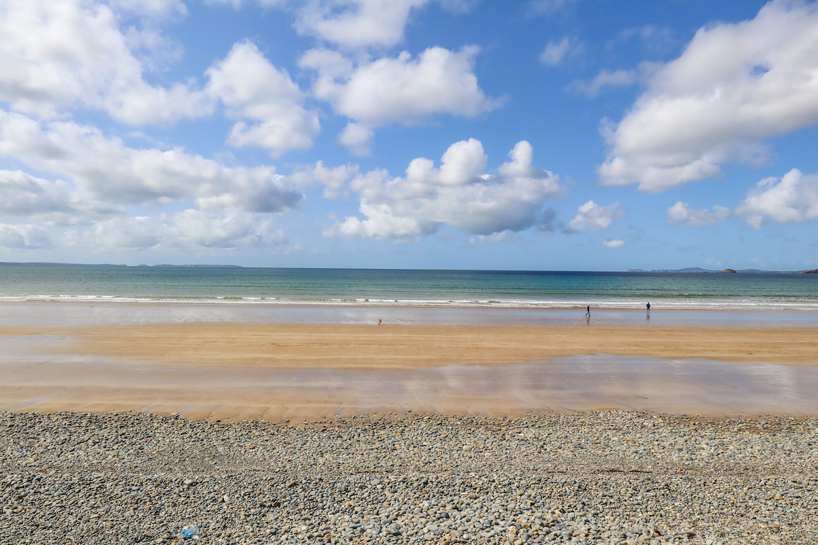 best beaches in South Wales, view of Newgate Beach with rocks, sand and water - best beaches in South Wales, view of Newgate Beach with rocks, sand and water