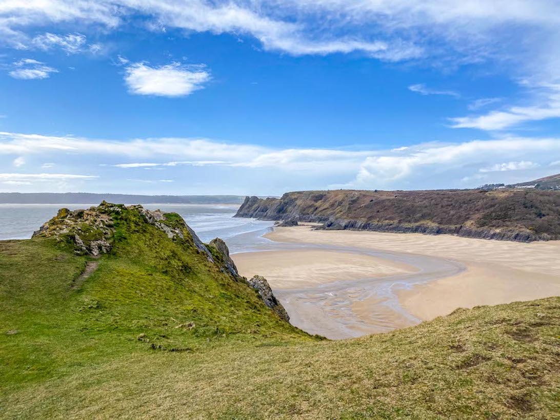 best beaches in South Wales, Three Cliffs Bay Beach with no people and cliffs - best beaches in South Wales, Three Cliffs Bay Beach with no people and cliffs