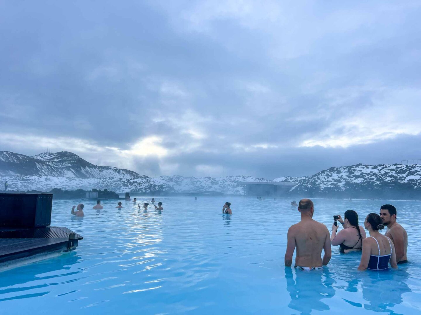 Visiting the Blue Lagoon, people enjoying the Blue Lagoon in Iceland - Visiting the Blue Lagoon, people enjoying the Blue Lagoon in Iceland