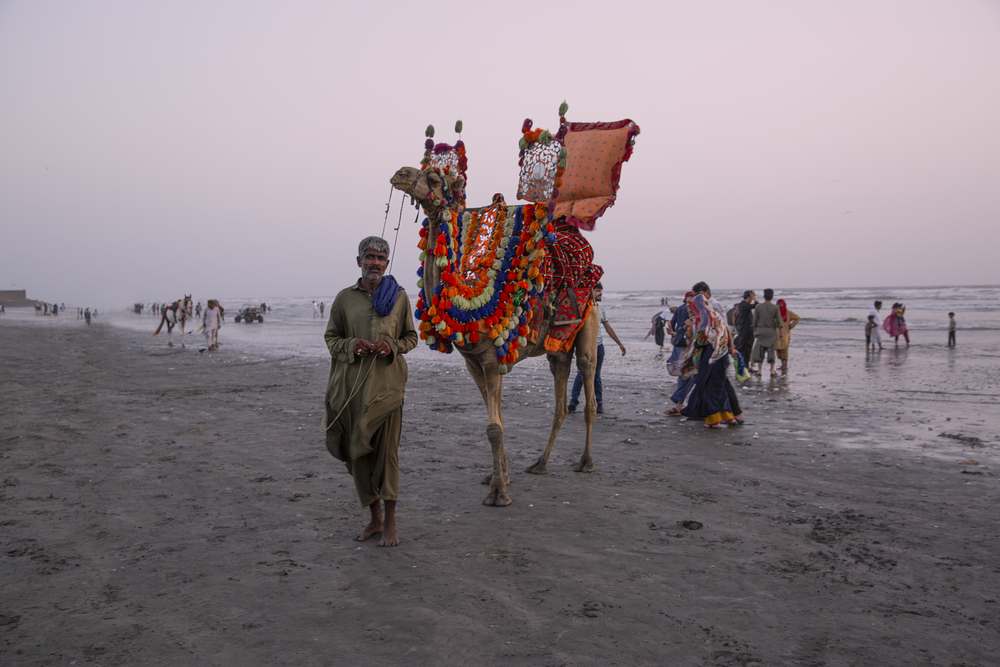 weekend breaks from Dubai, Karachi beach with camel riding