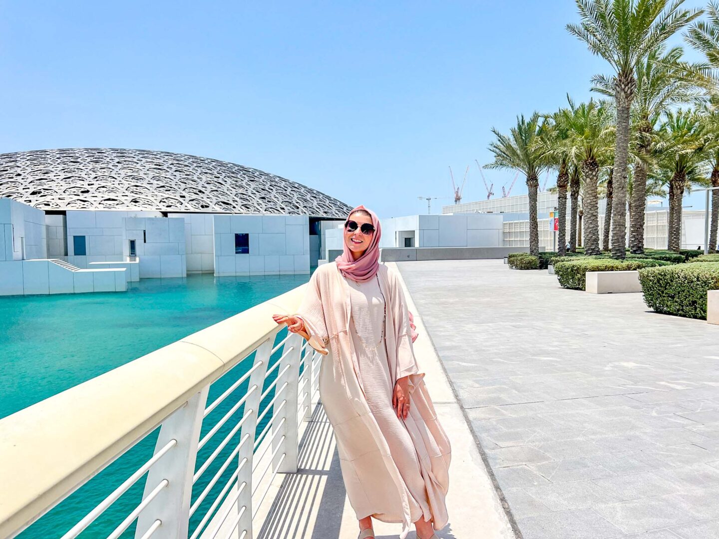 Dubai vs Abu Dhabi, Ellie in Abu Dhabi outside The Louvre 