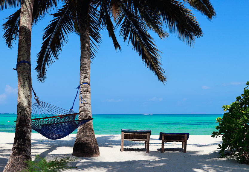 Best countries to visit in August, white sand, blue water beach in Zanzibar - Best countries to visit in August, white sand, blue water beach in Zanzibar
