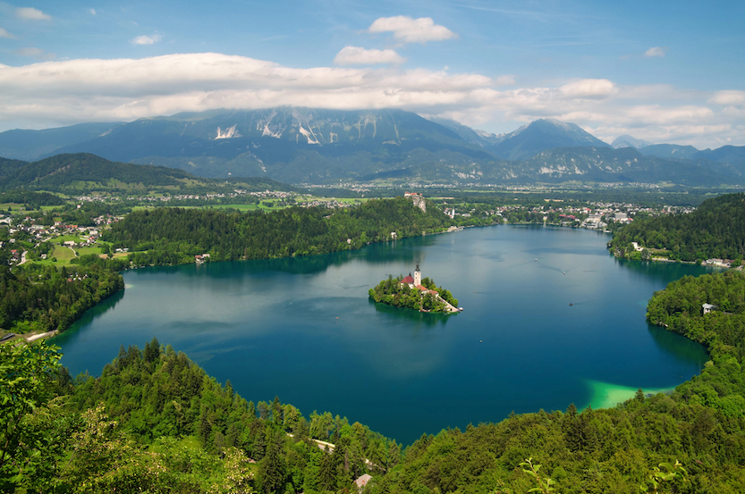 Best countries to visit in August, lake bled from above in summer - Best countries to visit in August, lake bled from above in summer