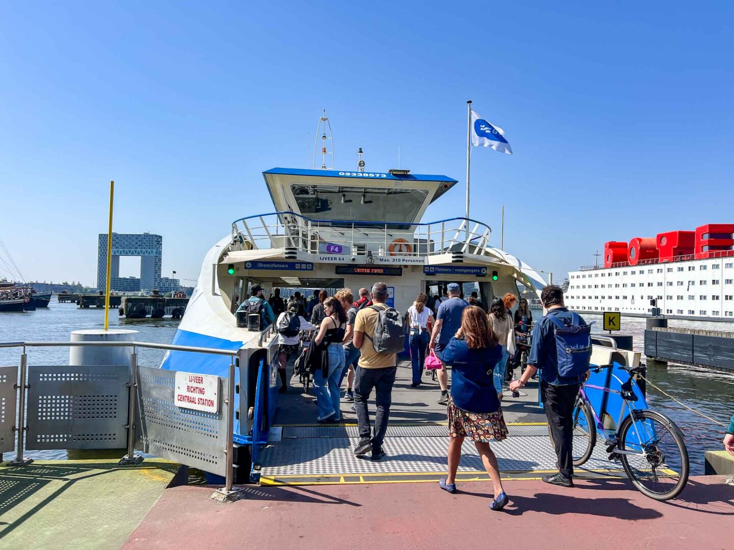 Things to do in Amsterdam Noord, passengers getting on free Amsterdam ferry - Things to do in Amsterdam Noord, passengers getting on free Amsterdam ferry
