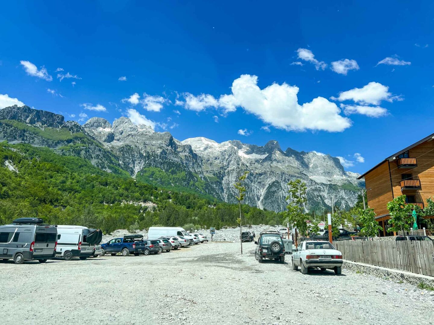 one day in Theth Albania, cars parked in Theth village - one day in Theth Albania, cars parked in Theth village