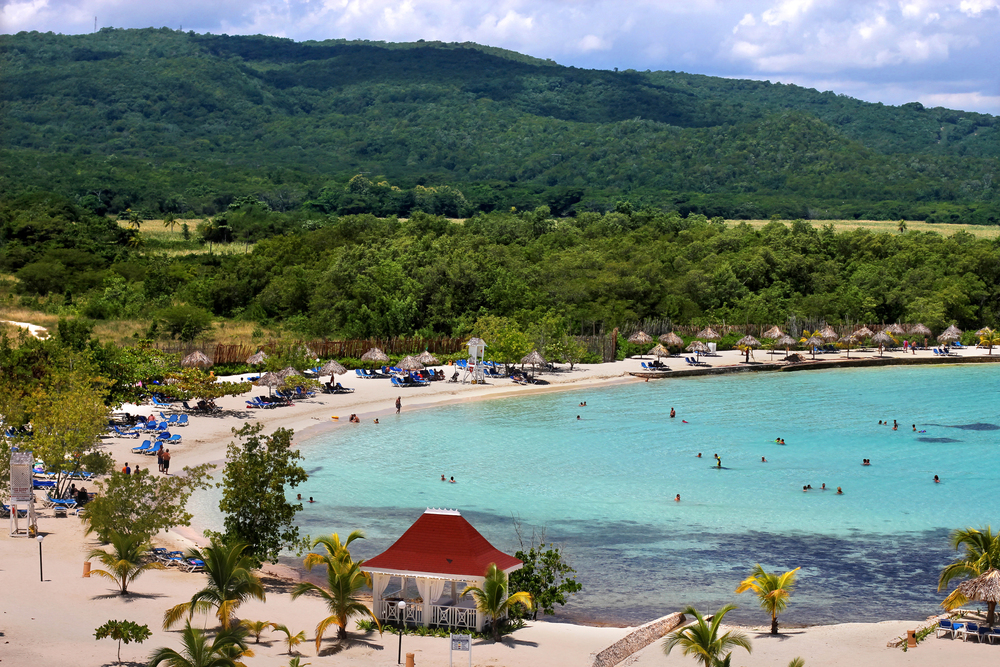 best countries to visit in July, Jamaica beach with cloud