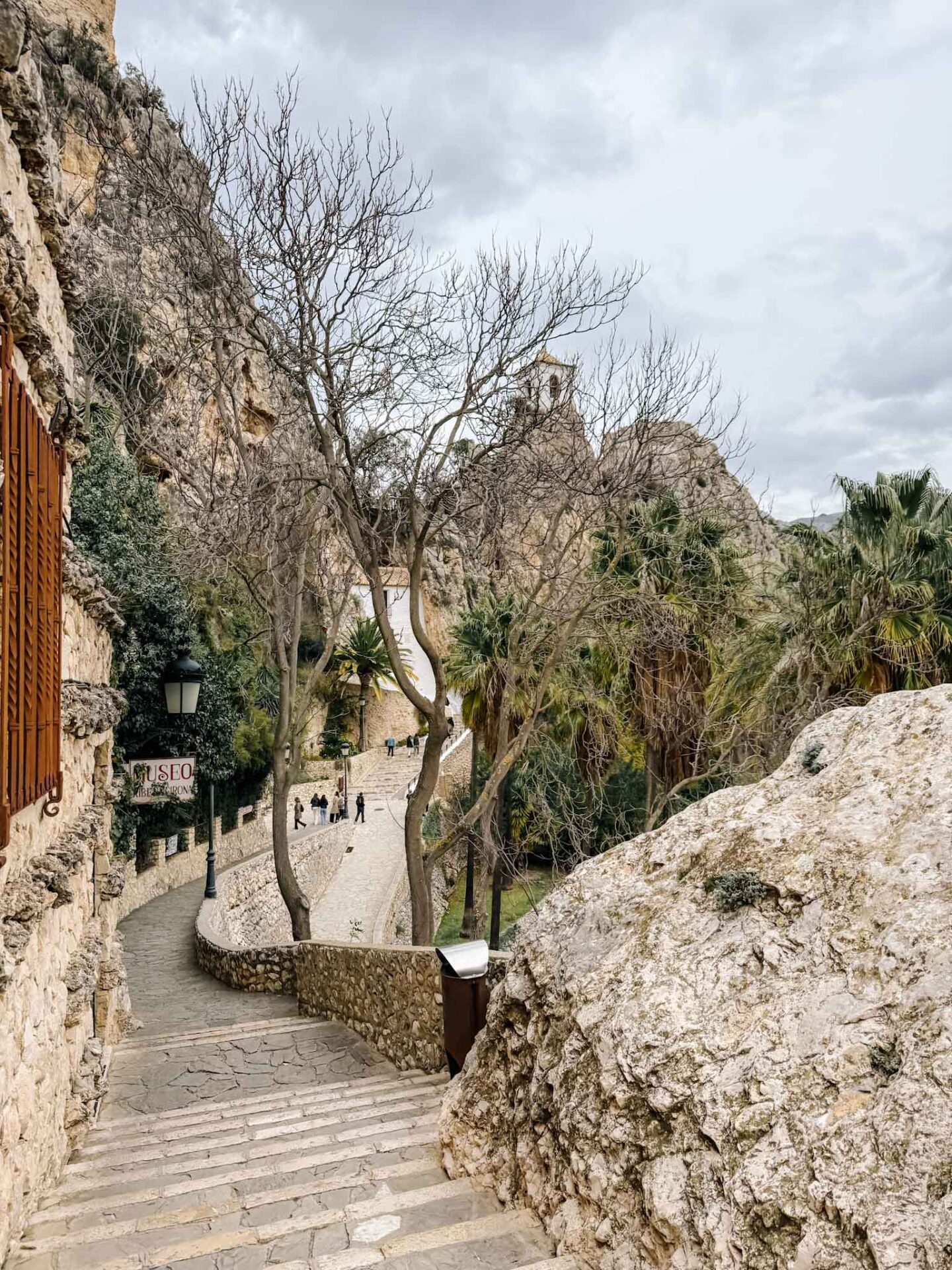 El Castell de Guadalest steps, Alicante with a baby