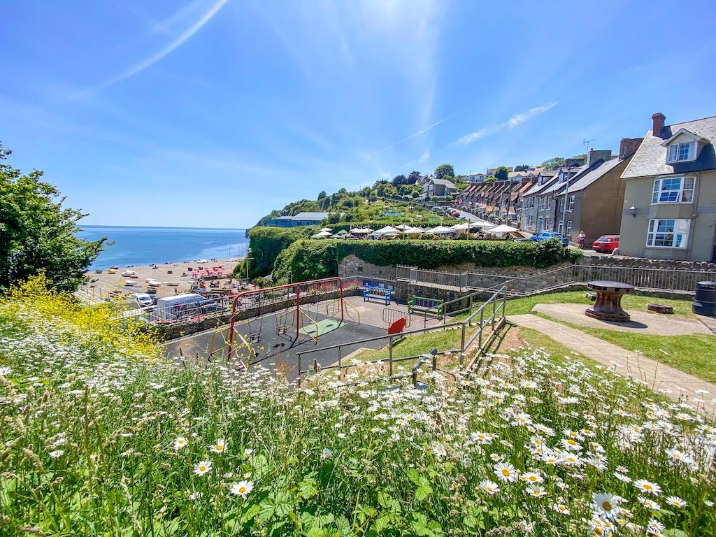best countries to visit in June, Devon coastline with blue skies in June