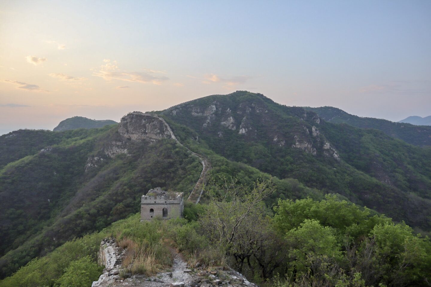 best places in asia to visit in may, best places to visit in asia in June, view of Great Wall of china at sunset in may