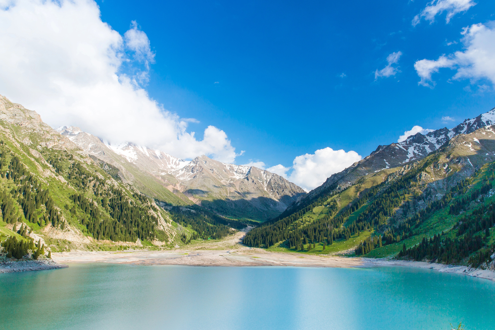 best places in asia to visit in may, best places to visit in asia in June, Big Almaty Lake with blue skies